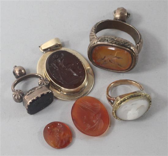 A 9ct gold mounted oval intaglio pendant and other items including seals and a ring.